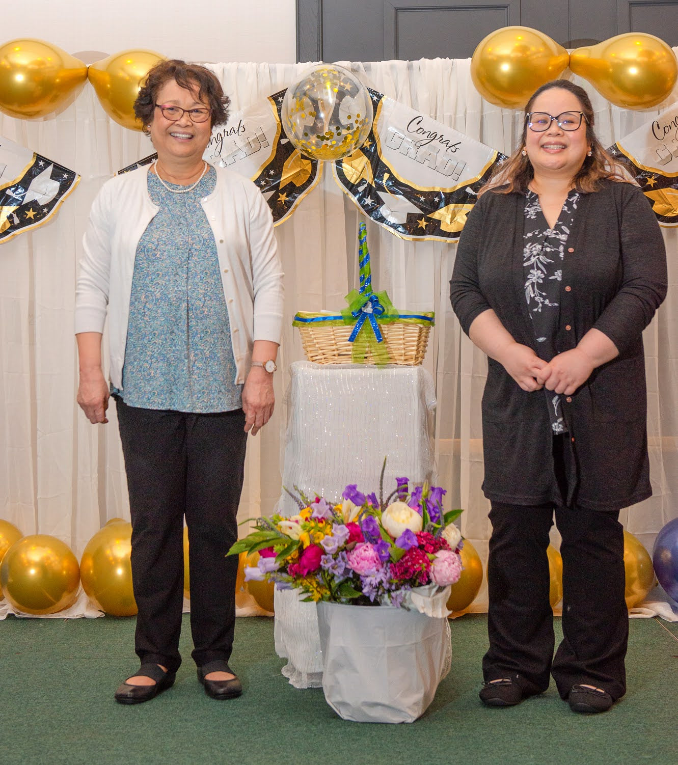 Florence Plantilla, the school's director and her daughter Marie.